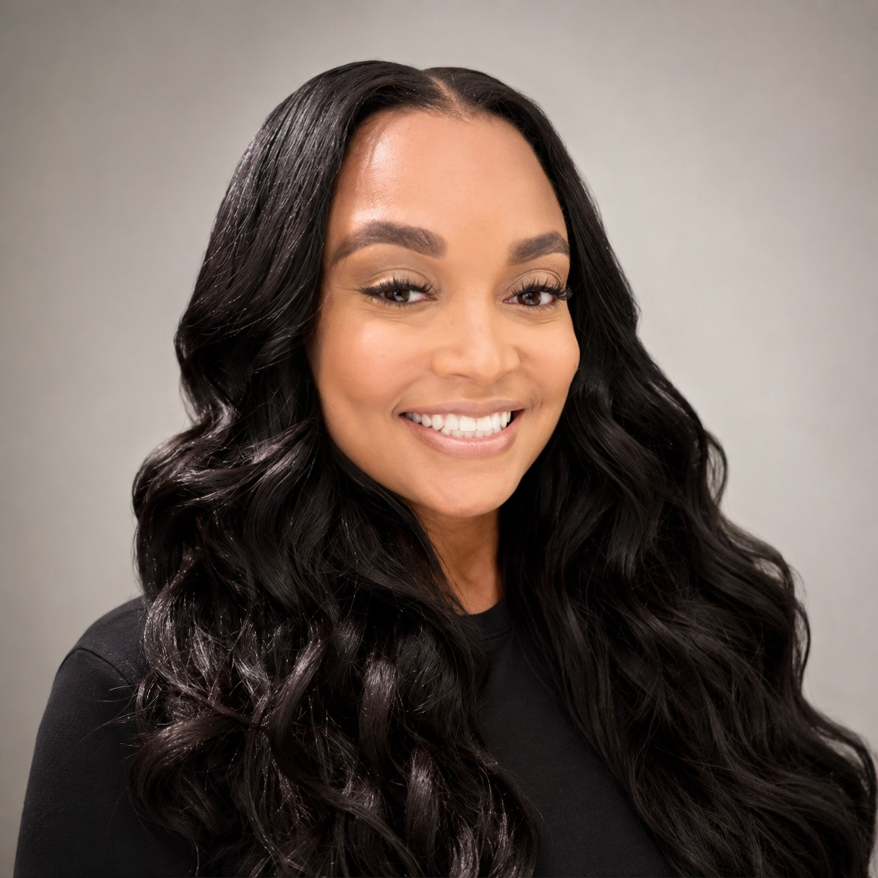 Yasmine, owner and licensed hairstylist at Underground Beauty Salon Suites