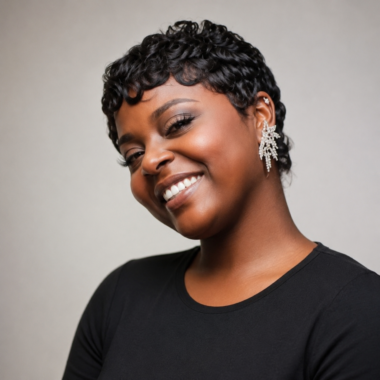 Ryy, locs, braids, crochet and natural hair specialist at Underground Beauty