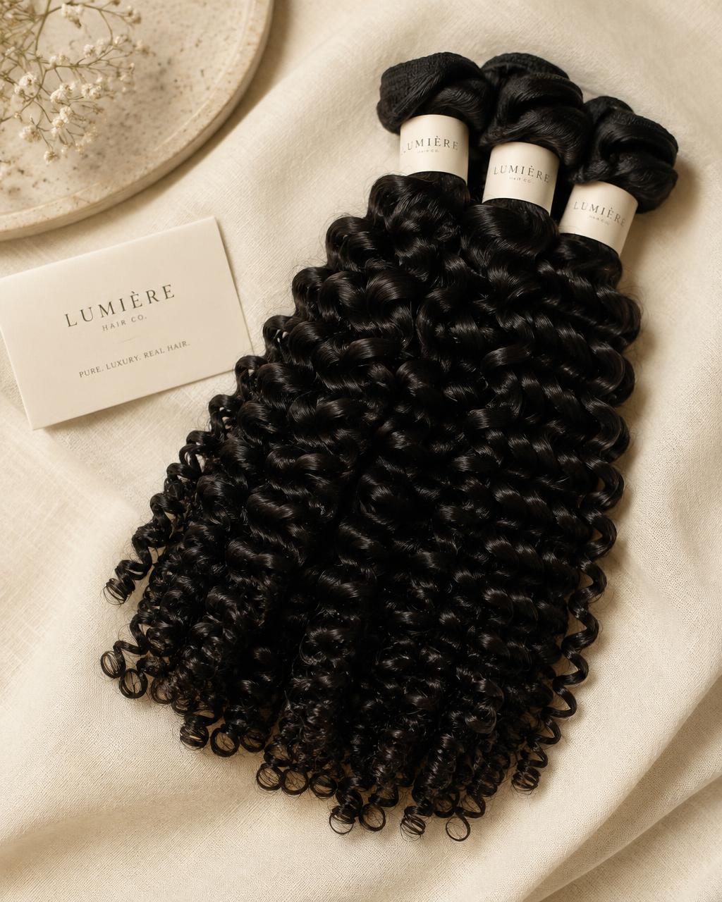 Bundles of raw deep curly human hair extensions