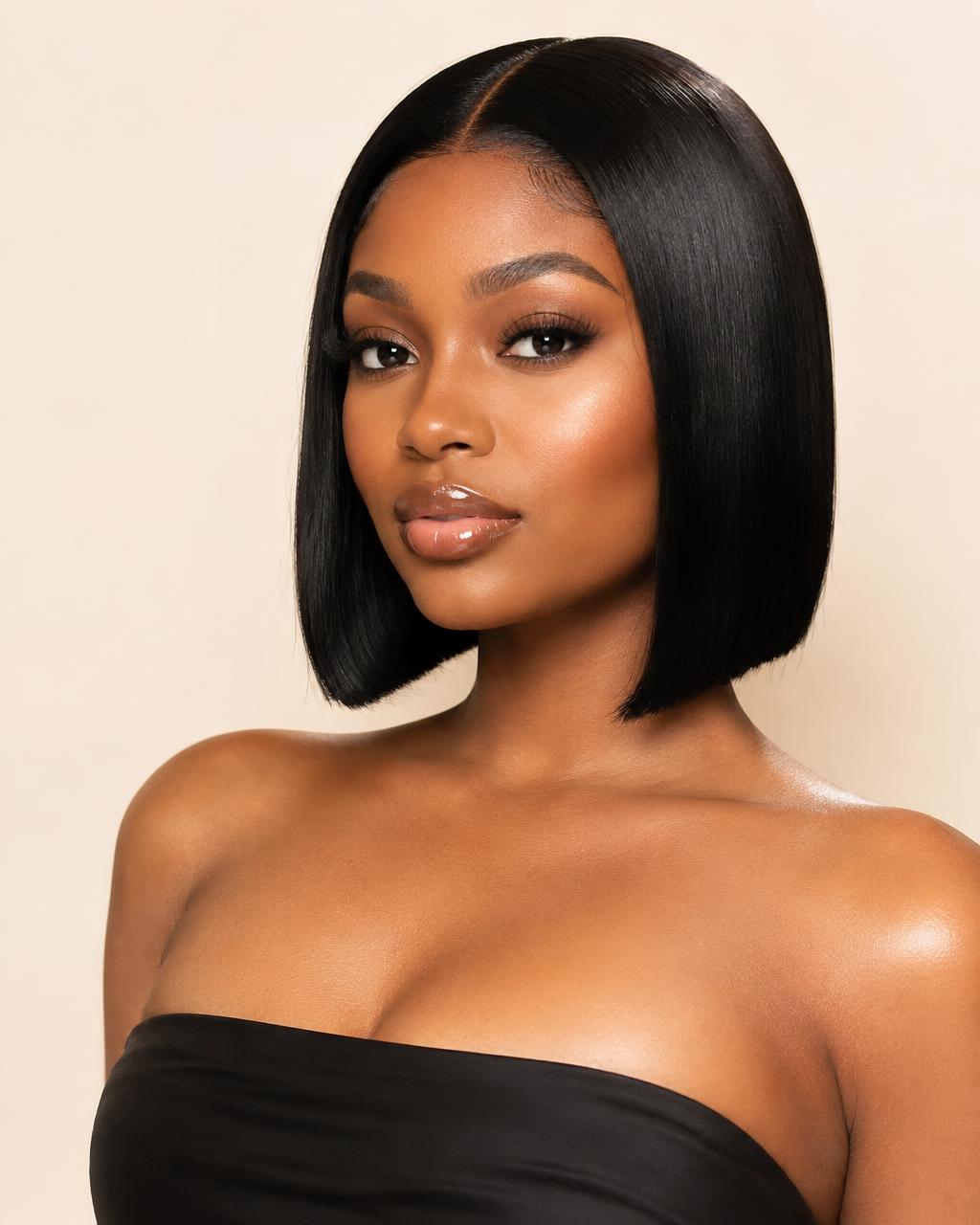 Woman wearing a sleek chin-length bob HD lace wig